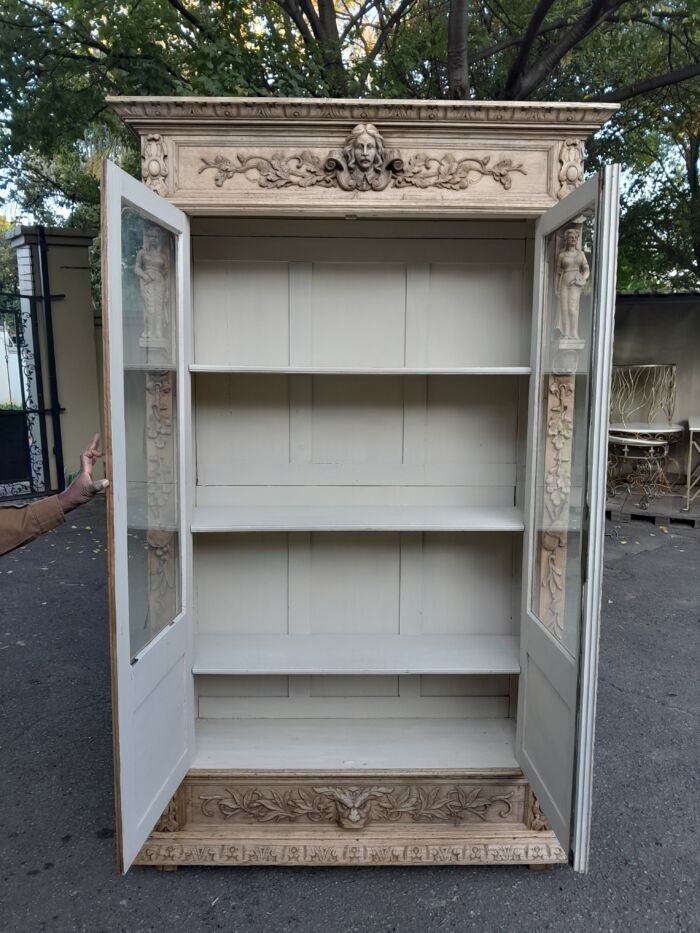 An Antique 19th Century Circa 1880 Large Renaissance-Revival European Oak Carved Bookcase / Cabinet With Glazed Glass Doors in a Contemporary Natural / Bleached Finish - Image 13