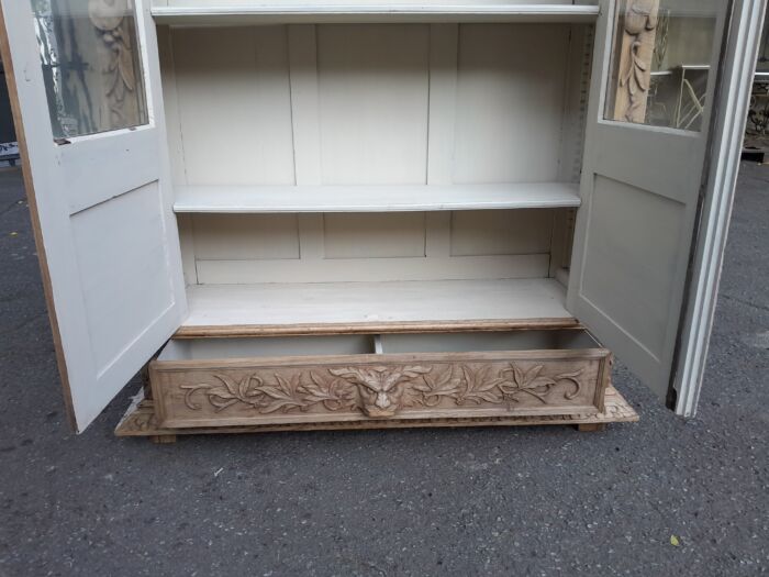 An Antique 19th Century Circa 1880 Large Renaissance-Revival European Oak Carved Bookcase / Cabinet With Glazed Glass Doors in a Contemporary Natural / Bleached Finish - Image 14