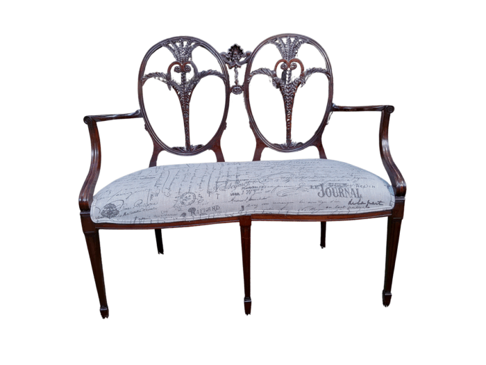 A Victorian Circa 1890 Carved Mahogany Settee Upholstered in a Custom Made Script Linen  for The Crown Collection
