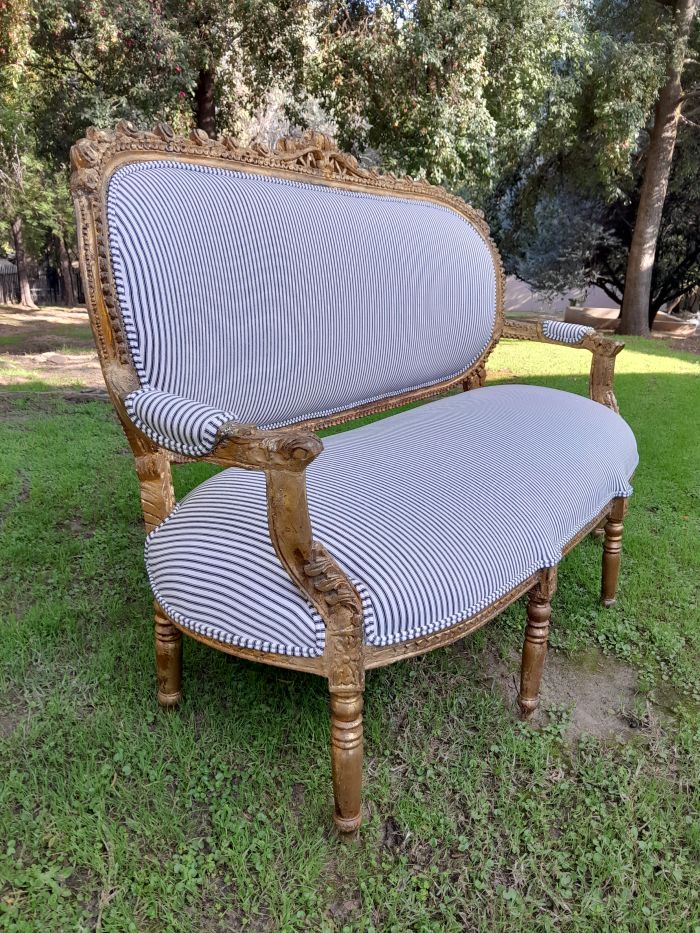 A 20th Century French Style Ornately Carved and Gilded Set Of Settee And a Pair Of Armchairs Upholstered in an Imported Fabric - Image 5