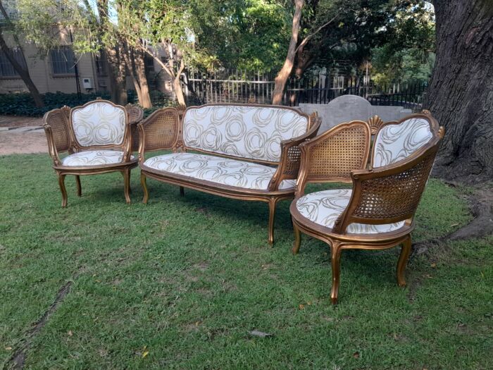 A Mid 20th Century Circa 1950 French Set Of Gilt Painted Wooden And Rattan Settee With A Pair Of Bergère Chairs Upholstered In A Custom Made Linen For The Crown Collection - Image 5