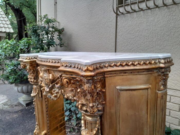 A 20TH Century French Style Ornately Hand Carved and Gilded Fireplace Surround - Image 7