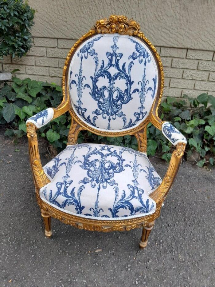 A 20TH Century French Louis XVI Style Set Of A Carved And Gilded Settee And Pair Of Armchairs - Image 7