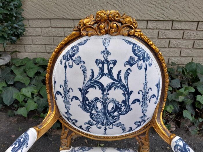 A 20TH Century French Louis XVI Style Set Of A Carved And Gilded Settee And Pair Of Armchairs - Image 9