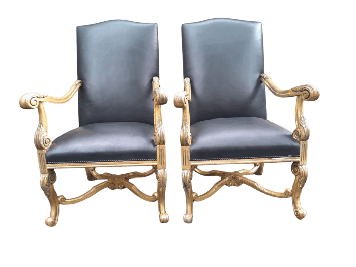 A 20TH Century French Louis XIV Style Carved And Hand Gilded in Gold Leaf Armchairs Upholstered In Leather