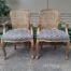 A Pair Of French Style Rattan And Carved Wooden Gilded Armchairs