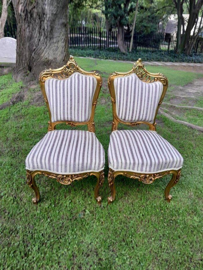A Pair of French Rococo Style Carved Wooden Gilded Armchairs - Image 2