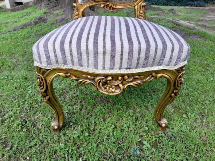 A Pair of French Rococo Style Carved Wooden Gilded Armchairs - Image 5