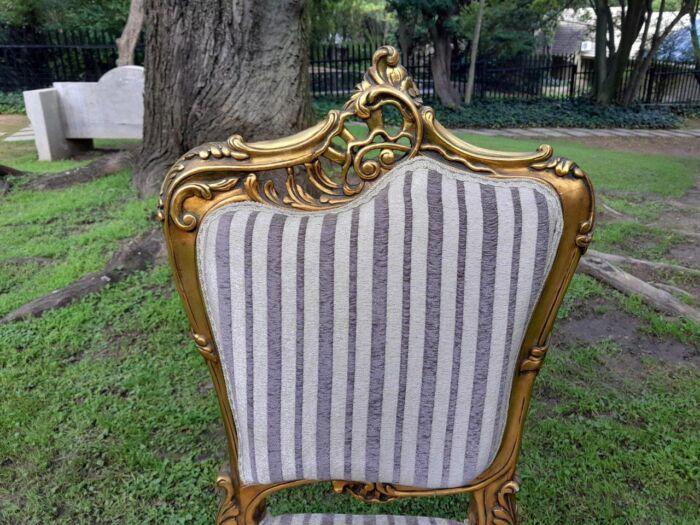 A Pair of French Rococo Style Carved Wooden Gilded Armchairs - Image 6