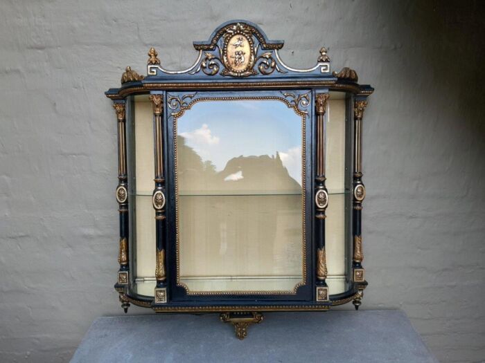 A Massive French 19th Century Carved and Gilded Wall Display Cabinet