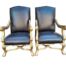 A Pair Of French Louis XIV Style Hand Gilded Armchairs Upholstered In Leather