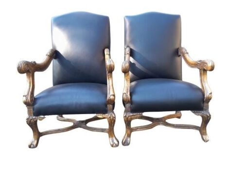 A Pair Of French Louis XIV Carved And Hand Gilded Armchairs Upholstered In Leather