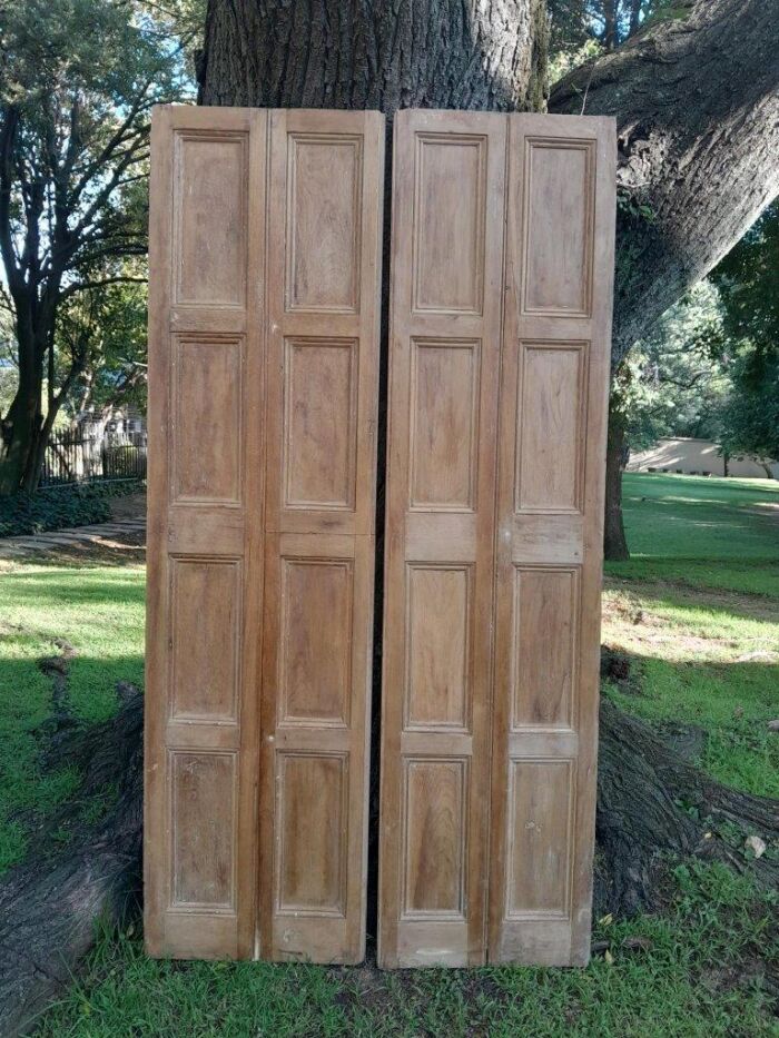 A 20th Century Pair of French Wooden Shutters with Bevelled Panels in a Contemporary Bleached Finish for Wall Décor