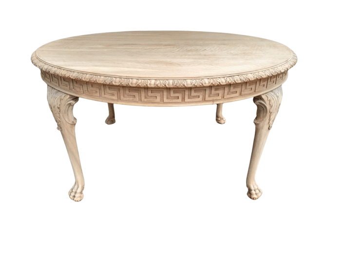 A 20th Century Heavily Carved Round Table in  a Contemporary Bleached Finish with Bevelled Mirror Top 