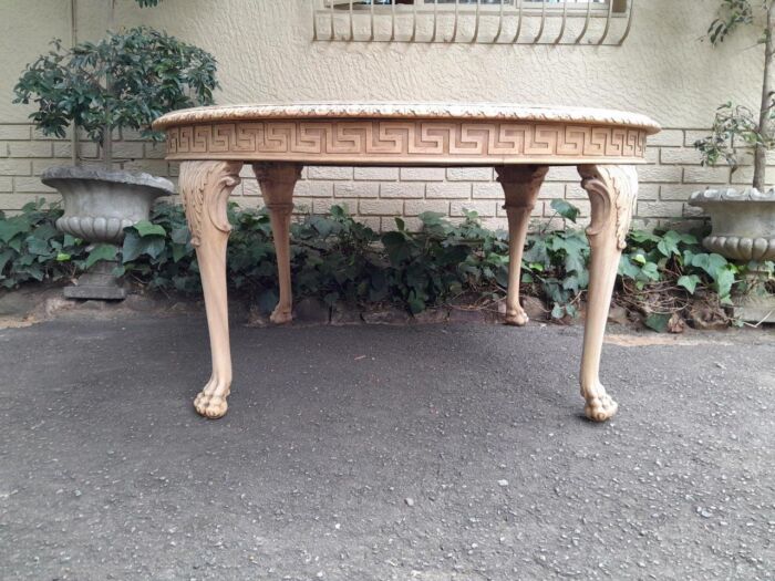 A 20th Century Heavily Carved Round Table in  a Contemporary Bleached Finish with Bevelled Mirror Top  - Image 2