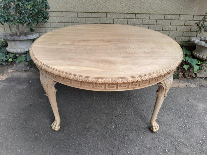 A 20th Century Heavily Carved Round Table in  a Contemporary Bleached Finish with Bevelled Mirror Top  - Image 3