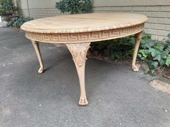 A 20th Century Heavily Carved Round Table in  a Contemporary Bleached Finish with Bevelled Mirror Top  - Image 4