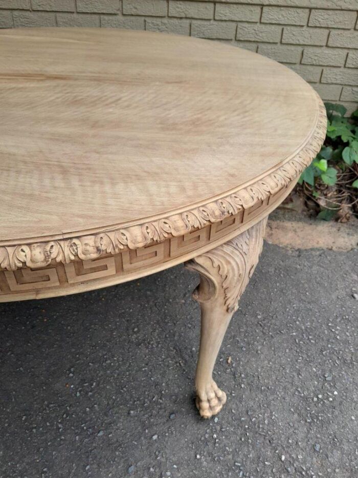 A 20th Century Heavily Carved Round Table in  a Contemporary Bleached Finish with Bevelled Mirror Top  - Image 7