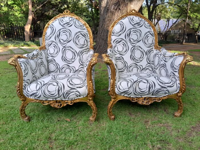 A 20th Century Pair of French Style Louis XVI Style Ornately Carved and Gilded Armchairs Upholstered in a Charcoal Linen/Cotton Blend Fabric - Image 2