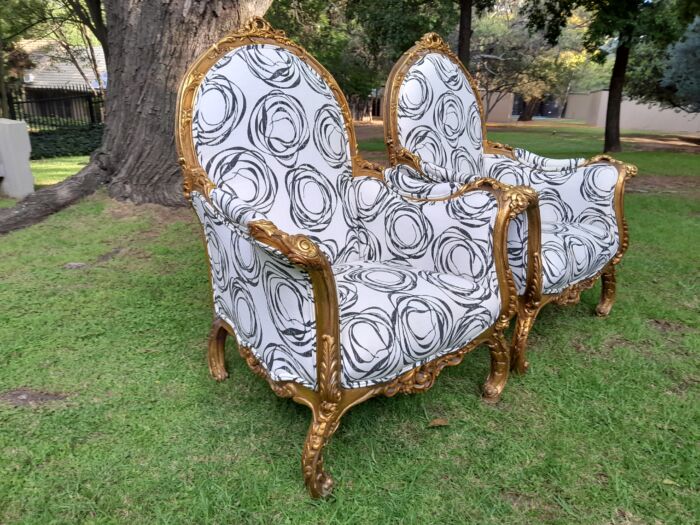 A 20th Century Pair of French Style Louis XVI Style Ornately Carved and Gilded Armchairs Upholstered in a Charcoal Linen/Cotton Blend Fabric - Image 3