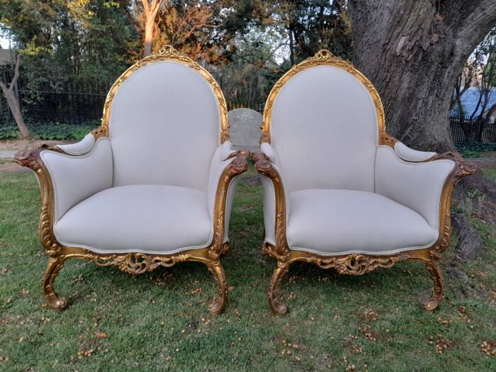 A 20th Century Pair of French Style Louis XVI Style Ornately Carved and Gilded Armchairs - Image 9