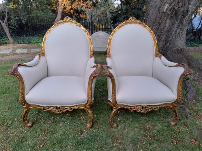 A 20th Century Pair of French Style Louis XVI Style Ornately Carved and Gilded Armchairs - Image 8