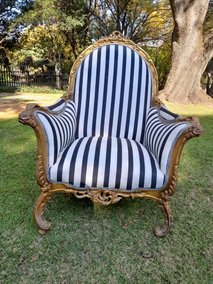 A 20th Century Pair of French Style Louis XVI Style Ornately Carved and Gilded Armchairs - Image 7