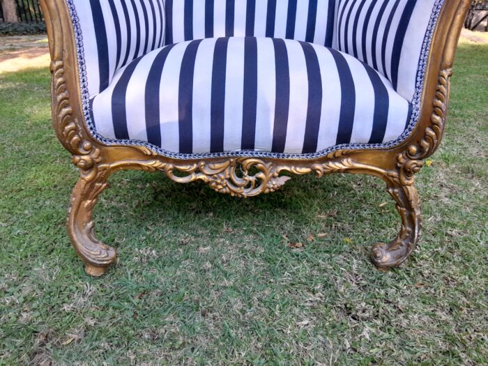 A 20th Century Pair of French Style Louis XVI Style Ornately Carved and Gilded Armchairs - Image 10