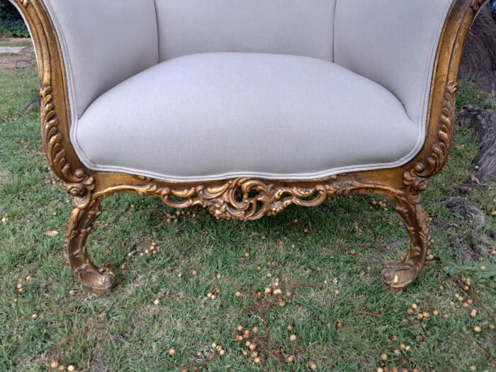 A 20th Century Pair of French Style Louis XVI Style Ornately Carved and Gilded Armchairs - Image 4