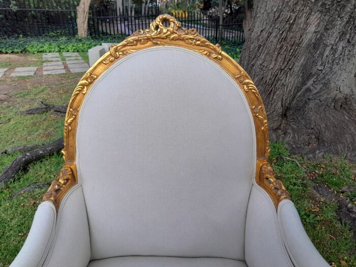 A 20th Century Pair of French Style Louis XVI Style Ornately Carved and Gilded Armchairs - Image 3