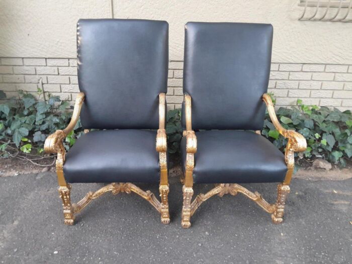 A 20th Century French Style Carved and Giltwood Arm Chairs Upholstered in Leather) - Image 2