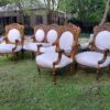 A 20th Century French Louis XVI Style Five Piece Set of Giltwood Settee and Four Armchairs - Image 3