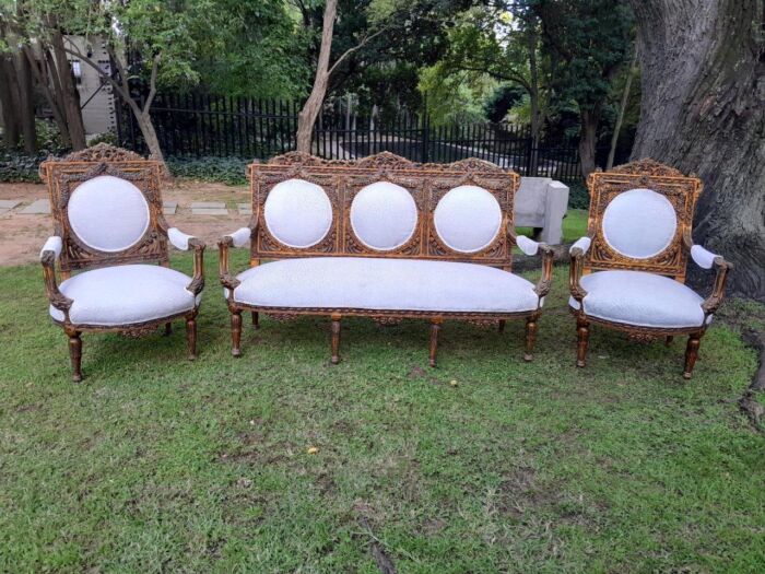 A 20th Century French Louis XVI Style Five Piece Set of Giltwood Settee and Four Armchairs - Image 4