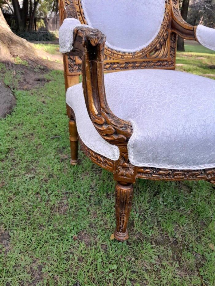 A 20th Century French Louis XVI Style Five Piece Set of Giltwood Settee and Four Armchairs - Image 11