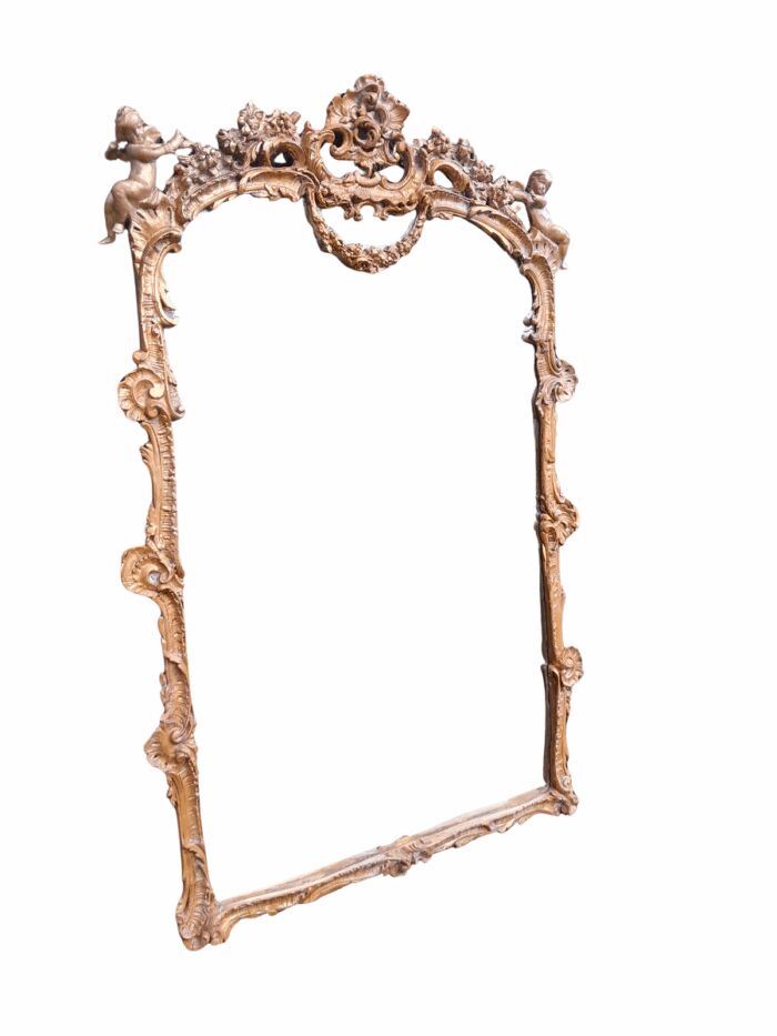 A French Rococo Style Ornately Carved and Gilded Bevelled Mirror 1