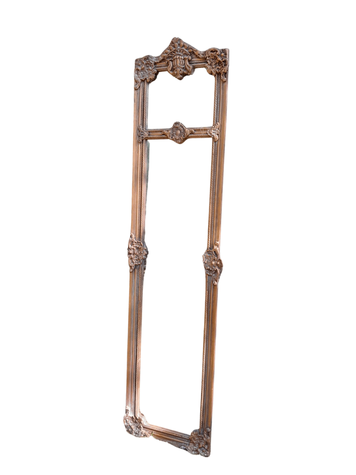 A French Style Ornately Carved and Gilded Bevelled Mirror