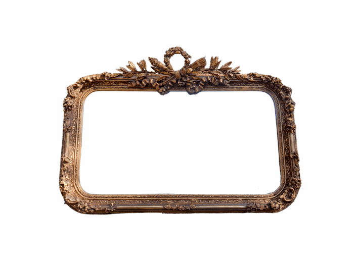 A French Style Ornately Carved and Gilded Bevelled Mirror