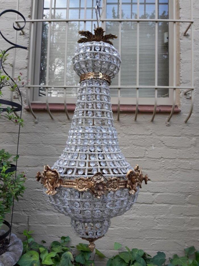 A French Style Pair of Brass Gilt Monumental Empire Chandeliers - Image 4