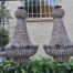 A French Style Pair of Large Gilt & Aged Monumental Empire Style Chandeliers