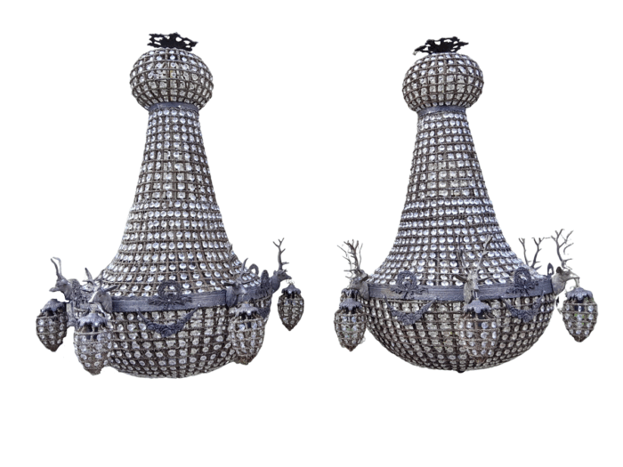 A Large Aged Pair of Monumental Empire French Style Chandeliers with Deer Head Figures