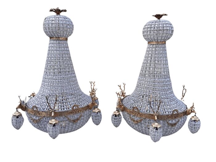 A Large Brass & Aged Pair of Monumental Empire French Style Chandeliers with Deer Head Figures