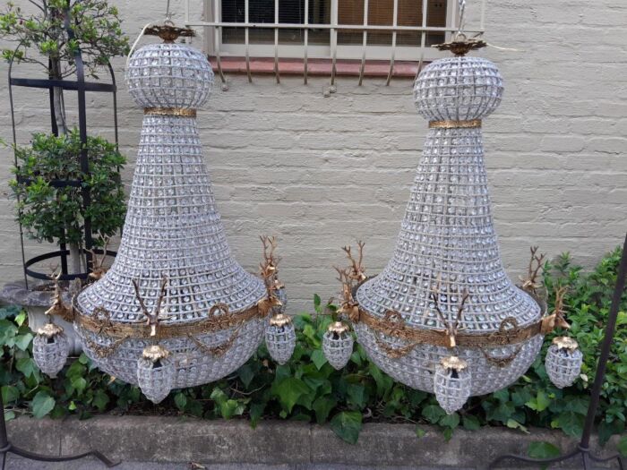 A Large Brass & Aged Pair of Monumental Empire French Style Chandeliers with Deer Head Figures - Image 2