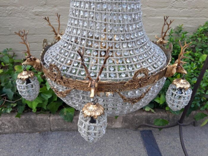 A Large Brass & Aged Pair of Monumental Empire French Style Chandeliers with Deer Head Figures - Image 7
