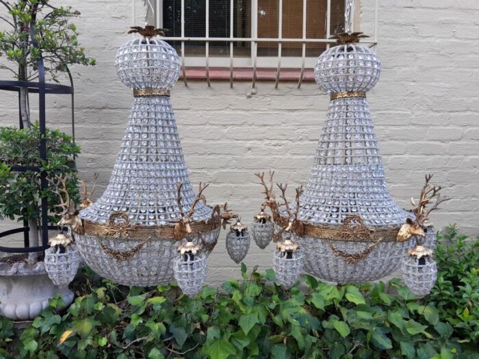 A French Style Pair of Aged Brass Pair of Monumental Empire Style Chandeliers with Deer Head Figures - Image 2