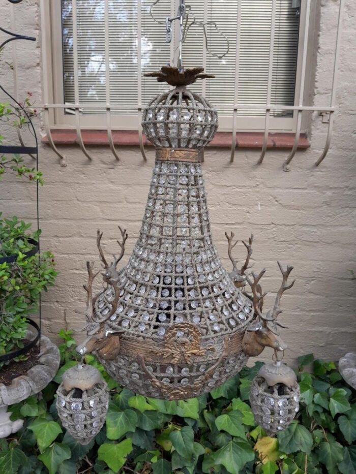 A Brass Gilt & Aged Monumental Empire French Style Chandelier with Deer Head Figures - Image 2