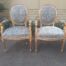 A French Style Pair of Carved Gold Arm-chairs