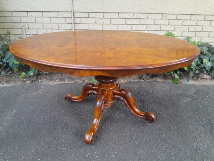 An Antique Victorian Burr Walnut Folding Table with Carved Base