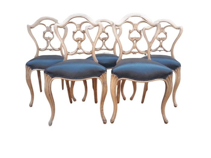 A 20th Century Set Of Five Carved Mahogany Dining Chairs In A Contemporary Bleached  /  Natural Finish Upholstered In Leather