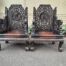 An Early 20th Century Circa 1920 Pair of Oriental Ornately Carved Throne Chairs