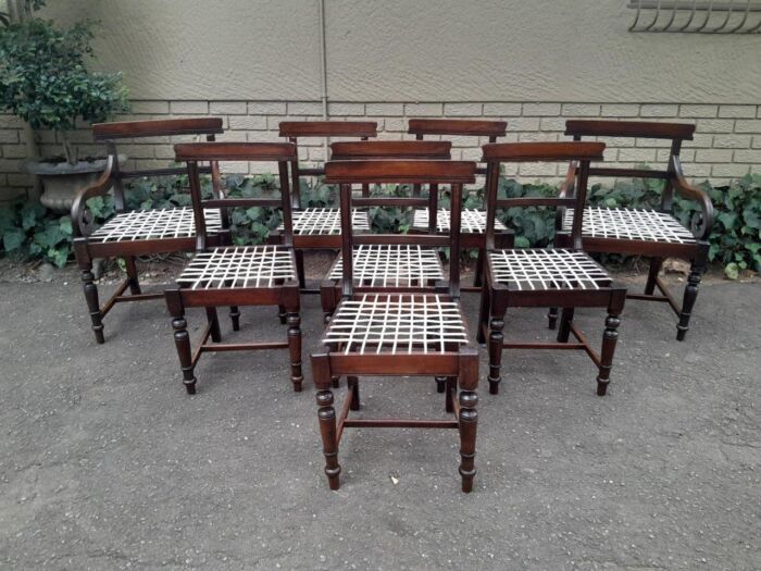 A 19th Century Set of Eight Cape Stinkwood Dining Charis with Riempie Seat Comprising Two Carvers and Six Dining Chairs  Provenance: The Tulbagh Saffer Collection - Image 2